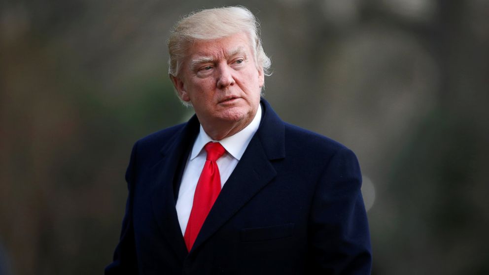 President Donald Trump walks from Marine One upon his return to the White House in Washington, March 19, 2017.