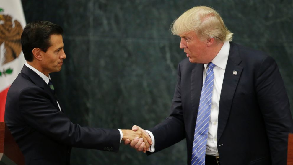 Then-presidential nominee Donald Trump and Mexico's President Enrique Pena Nieto shake hands at a press conference at the Los Pinos residence in Mexico City, Mexico, Aug. 31, 2016.