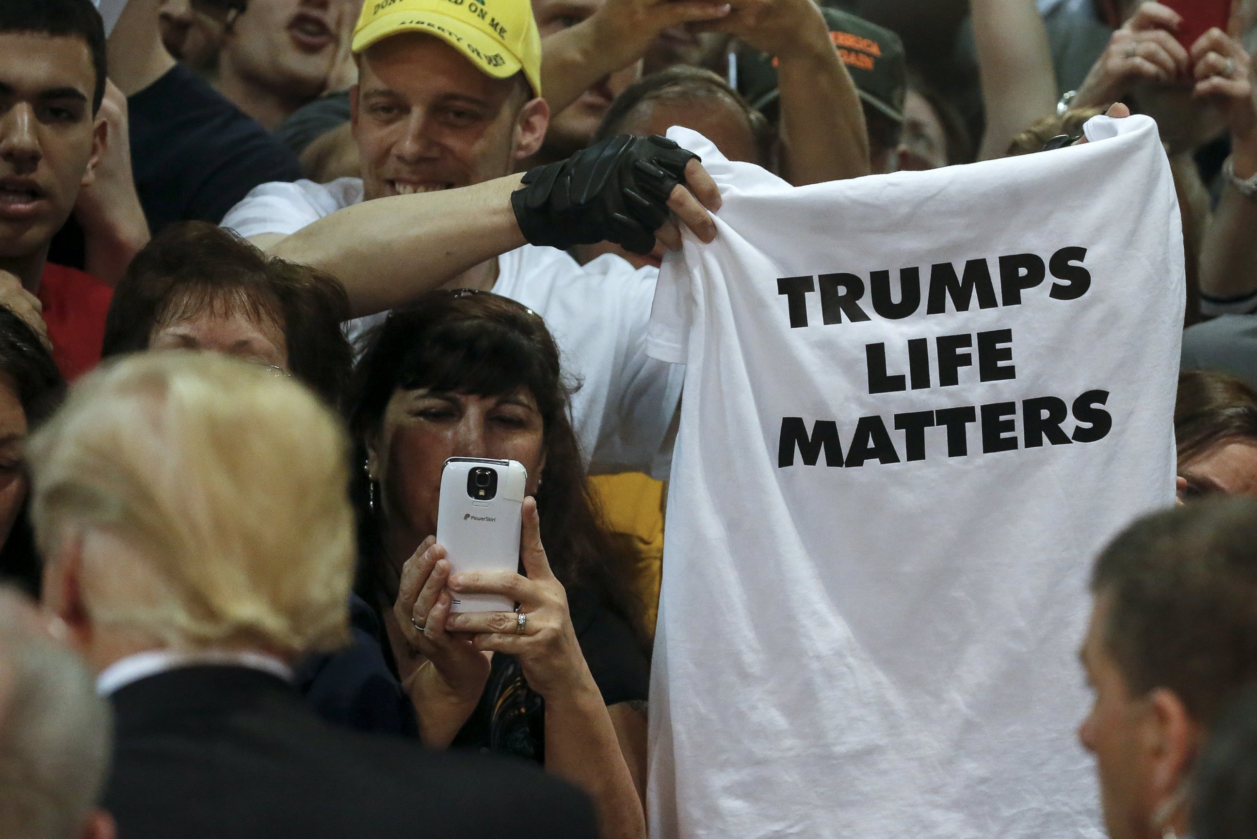 PHOTO: A man holds up a "Trumps Life Matters" t-shirt following a U.S. Republican presidential candidate Donald Trump campaign rally in Syracuse, New York, April 16, 2016.