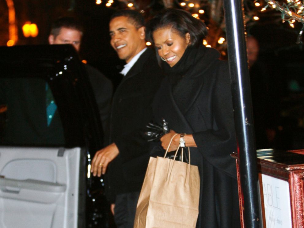 PHOTO: President Barack Obama and first lady Michelle Obama depart Table 52 restaurant after enjoying a Valentines Day dinner together in Chicago, Ill. on Feb. 14, 2009.