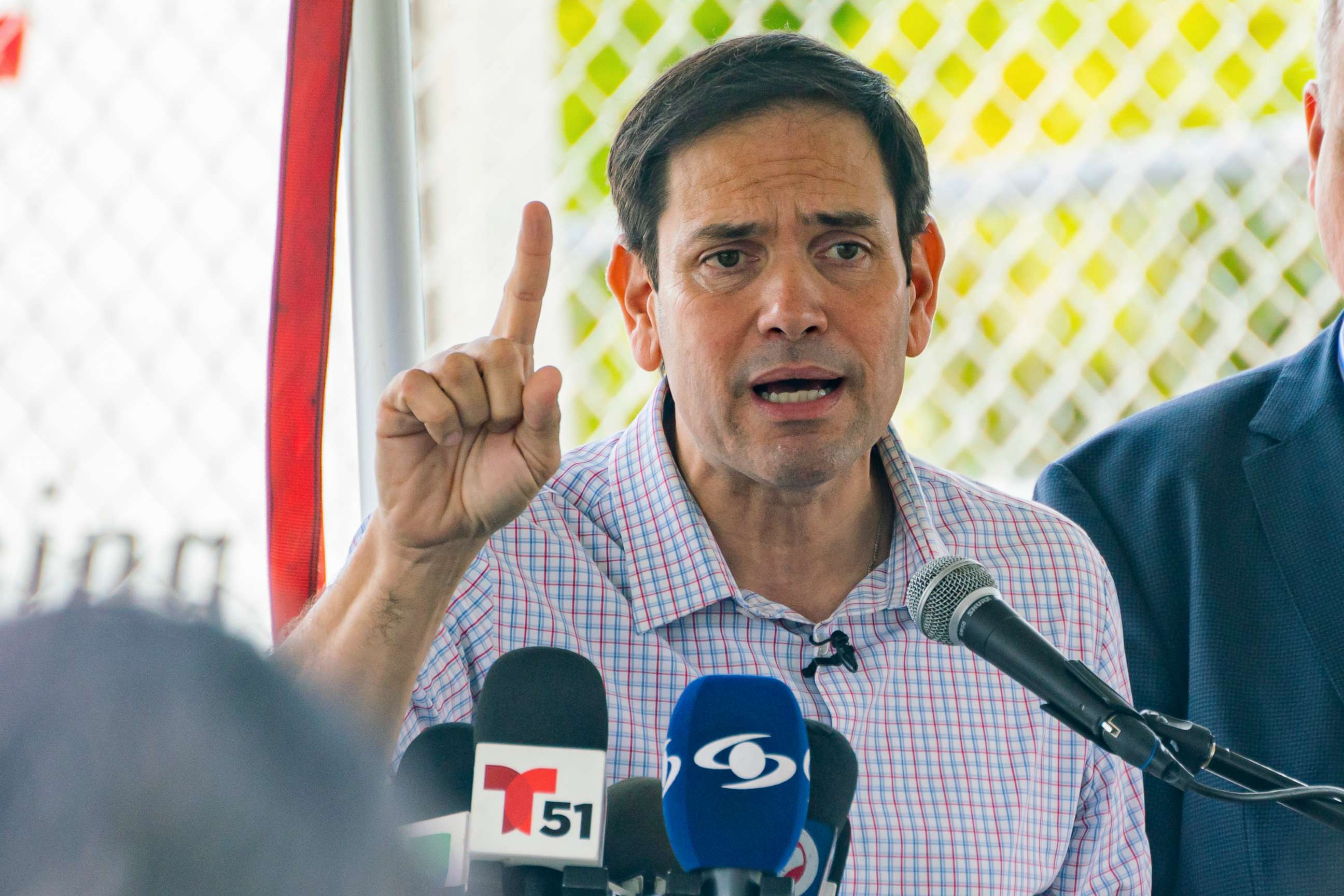 PHOTO: Sen. Marco Rubio reacts to a speaker on the first day of voting in Miami, Oct. 24, 2022. 
