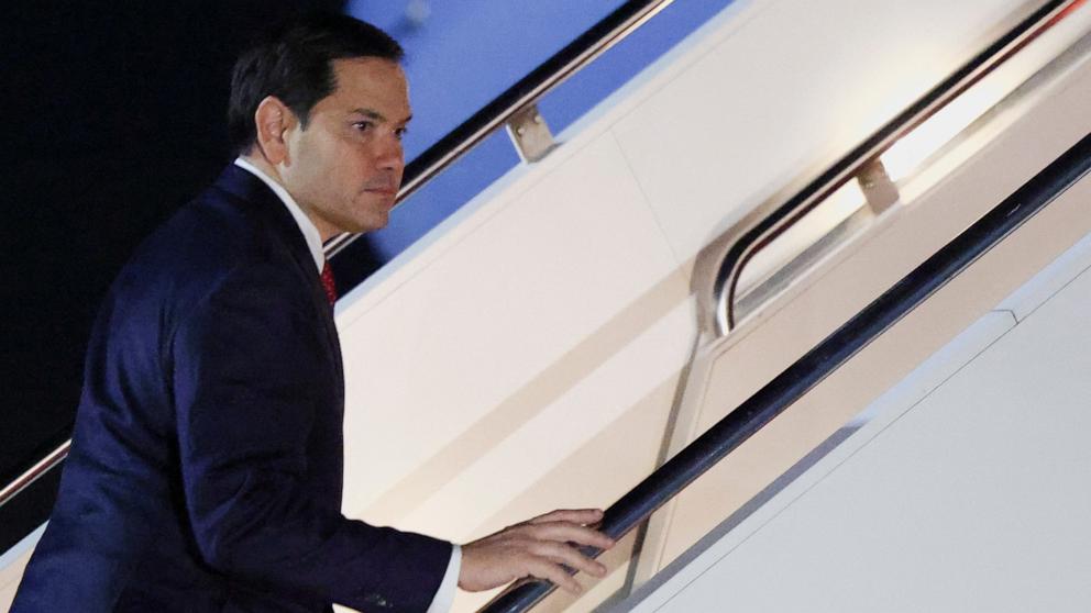 PHOTO: Secretary of State Marco Rubio boards a plane as he departs Joint Base Andrews with him to the Munich Security Conference, Germany, from Joint Base Andrews, Md., on Feb. 13, 2025.