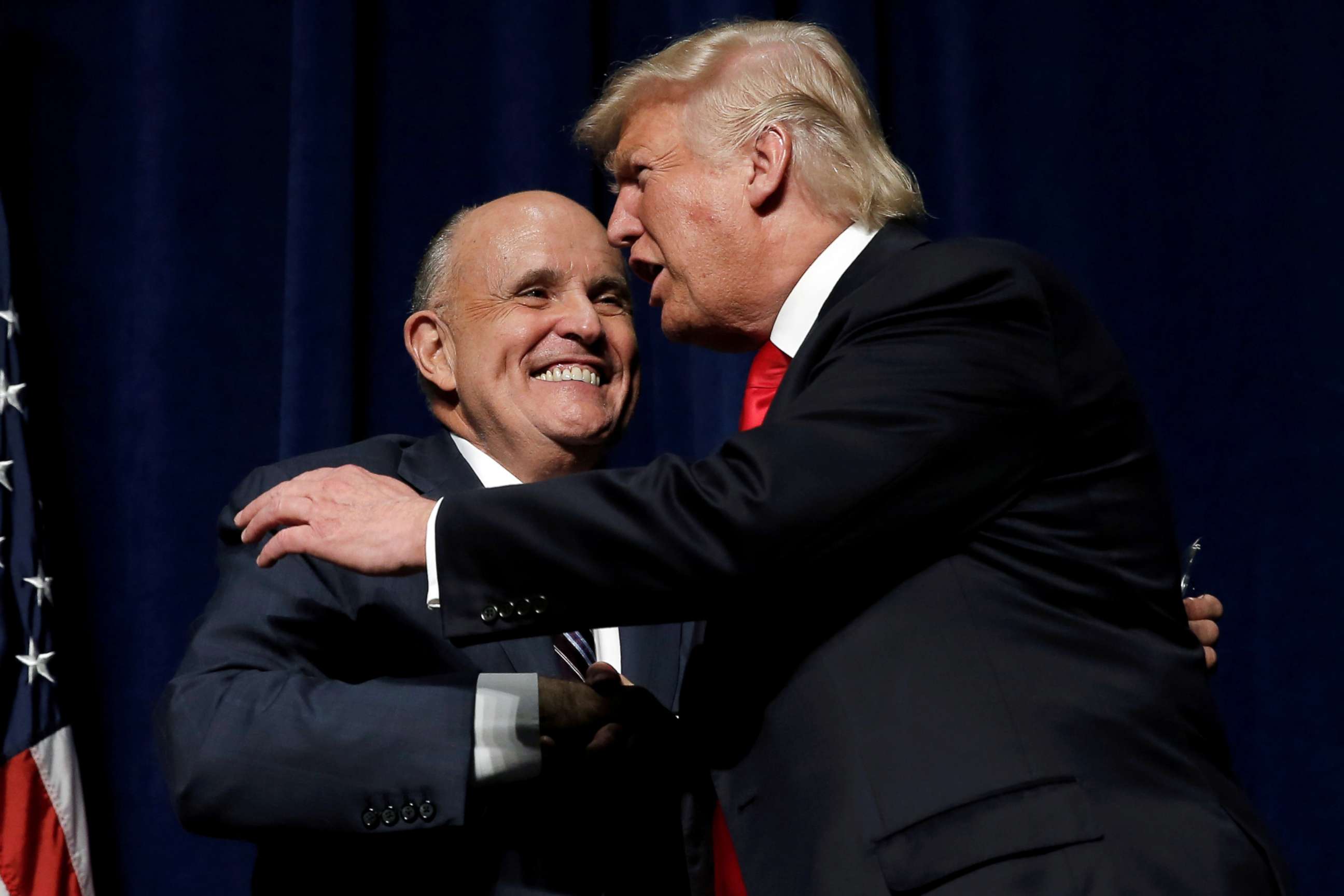 PHOTO: Republican presidential nominee Donald Trump embraces former New York City Mayor Rudolf Giuliani at a campaign rally in Greenville, N.C., Sept. 6, 2016.