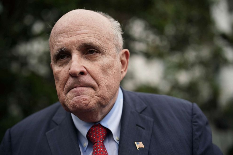 PHOTO: Rudy Giuliani, former New York City mayor and current lawyer for President Donald Trump, speaks to members of the media during a White House event at the South Lawn of the White House in Washington, D.C., May 30, 2018.