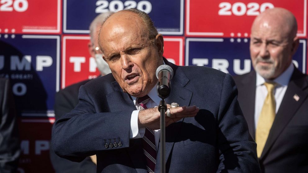 PHOTO: Rudy Giuliani, the personal attorney for the president, speaks to the media at a press conference held in the back parking lot of landscaping company on Nov. 7, 2020, in Philadelphia.