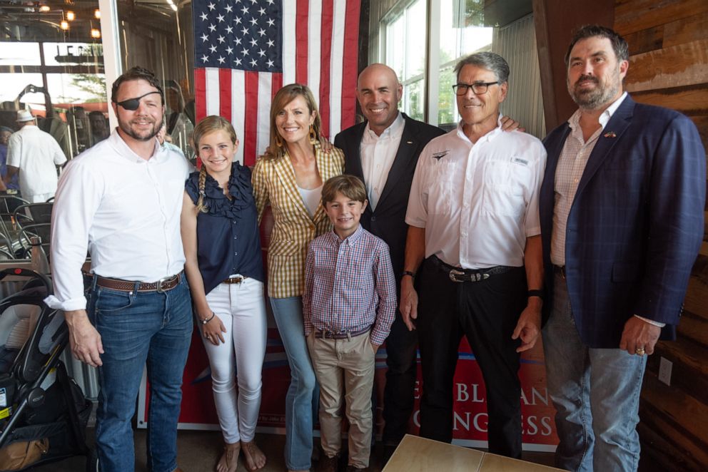 PHOTO: Jake Ellzey, center, campaigns for congress with other Texas Republican politicians. 