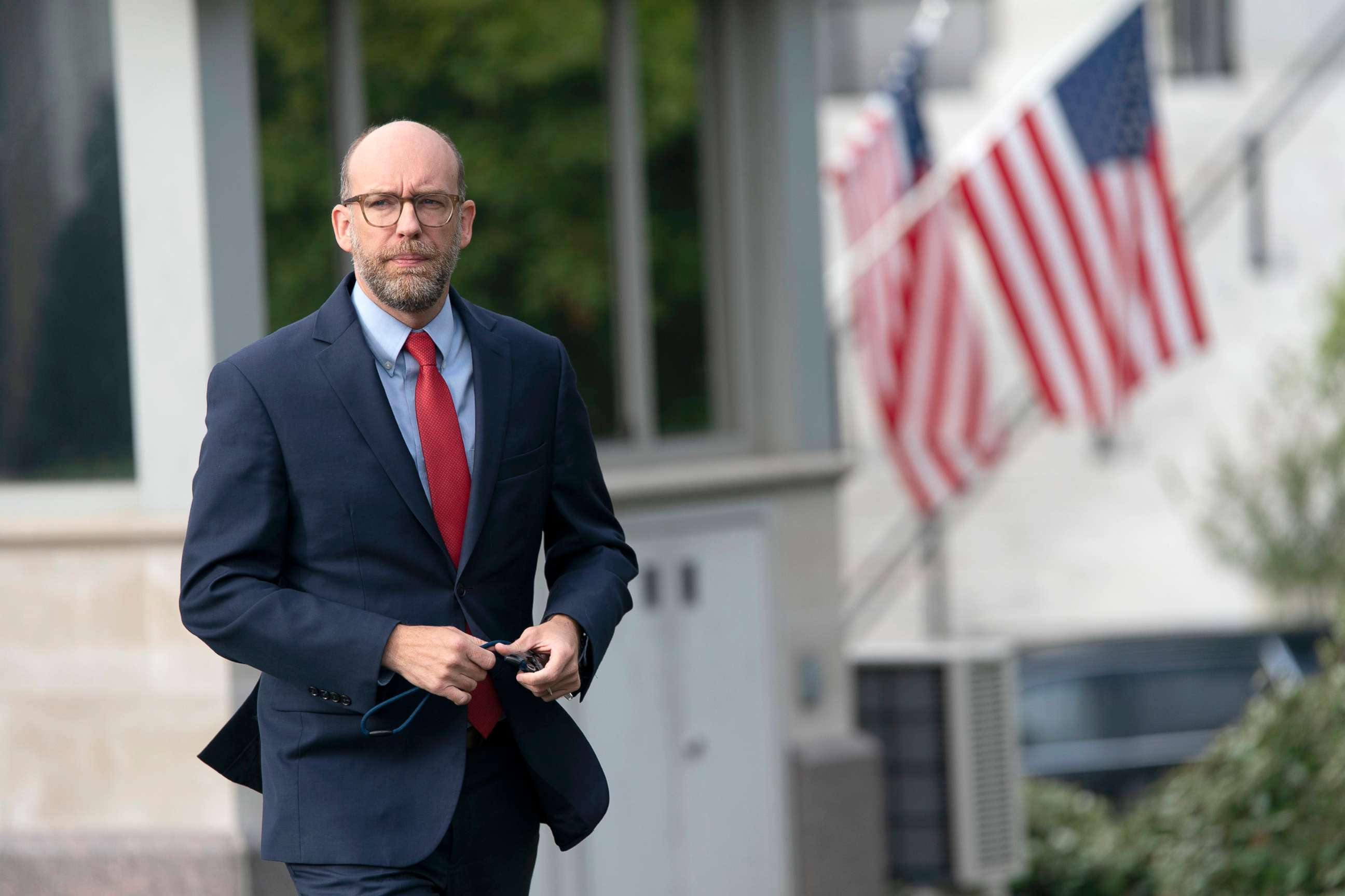 PHOTO: Office of Management and Budget (OMB) Acting Director Russell Vought walks from the White House to participate in a television interview, Oct. 9, 2019.
