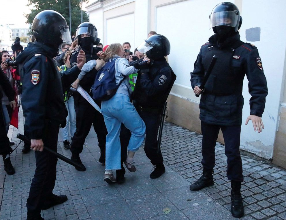 PHOTO: Law enforcement officers detain Daria Sosnovskaya after a rally to demand authorities allow opposition candidates to run in the upcoming local election in Moscow, Aug. 10, 2019.
