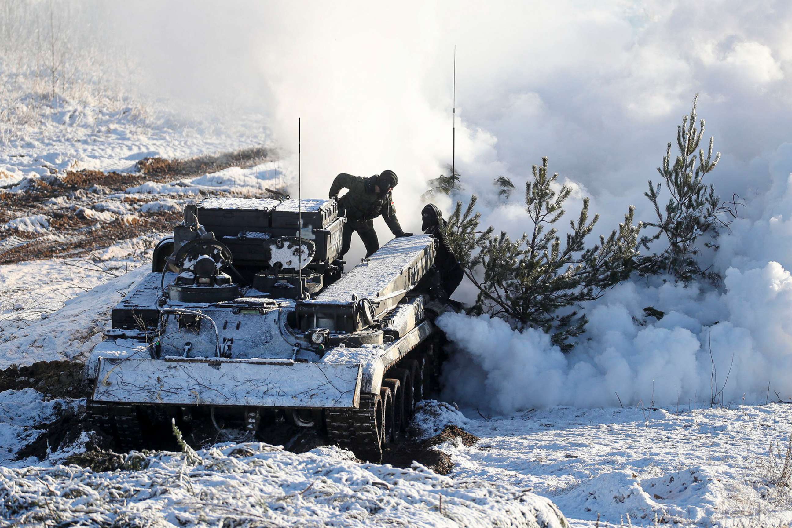 PHOTO: Soldiers work with their military vehicle at the Gozhsky training ground during the Union Courage-2022 Russia-Belarus military drills in Belarus, Feb. 12, 2022.