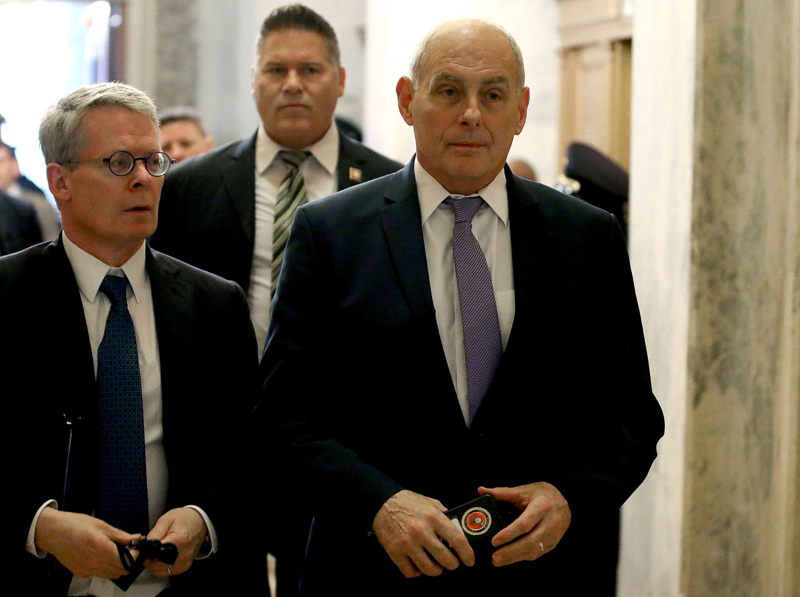 PHOTO: White House lawyer Emmet Flood, left and White House Chief of Staff John Kelly arrive to attend a briefing with members of the so-called 'Gang of Eight' at the U.S. Capitol May 24, 2018 in Washington, DC.