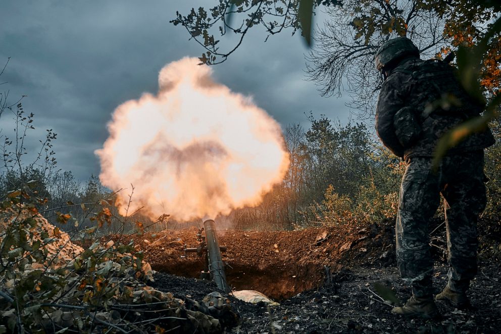 PHOTO: Ukrainian soldiers fire the Russian positions with the mortar in Bakhmut, Donetsk region, Ukraine, Oct. 21, 2022.