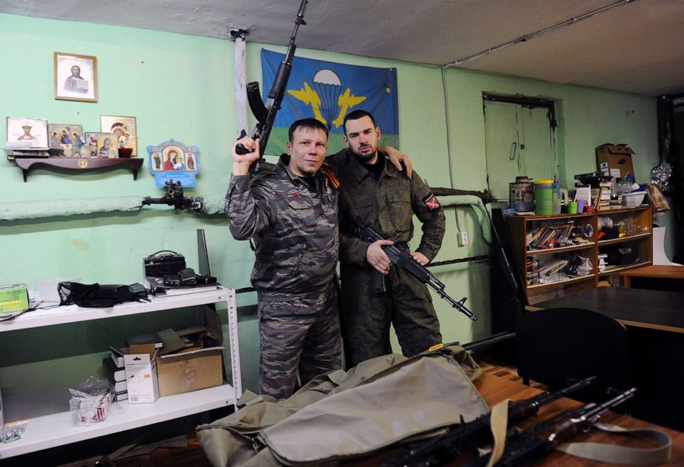PHOTO: In this Feb. 28, 2015, file photo, members of the Russian Imperial Movement, a nationalist group in Russia, pose for a picture with weapon simulators at a training base in Saint-Petersburg.