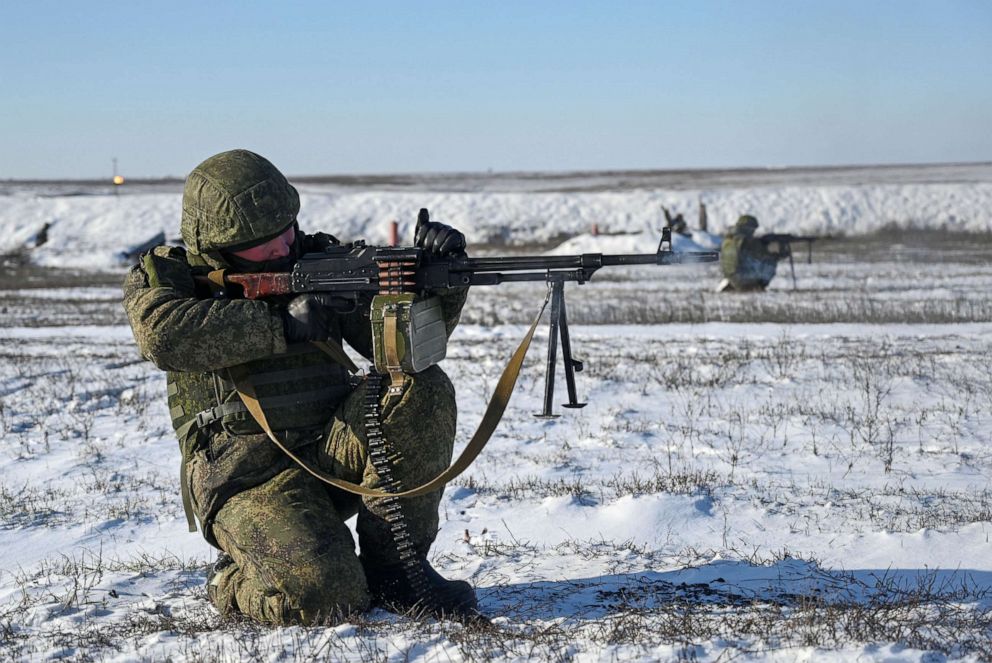 PHOTO: In this Dec. 22, 2021, file photo, Russian service members fire weapons during tactical combat exercises at the Kadamovsky range in the Rostov region, Russia.