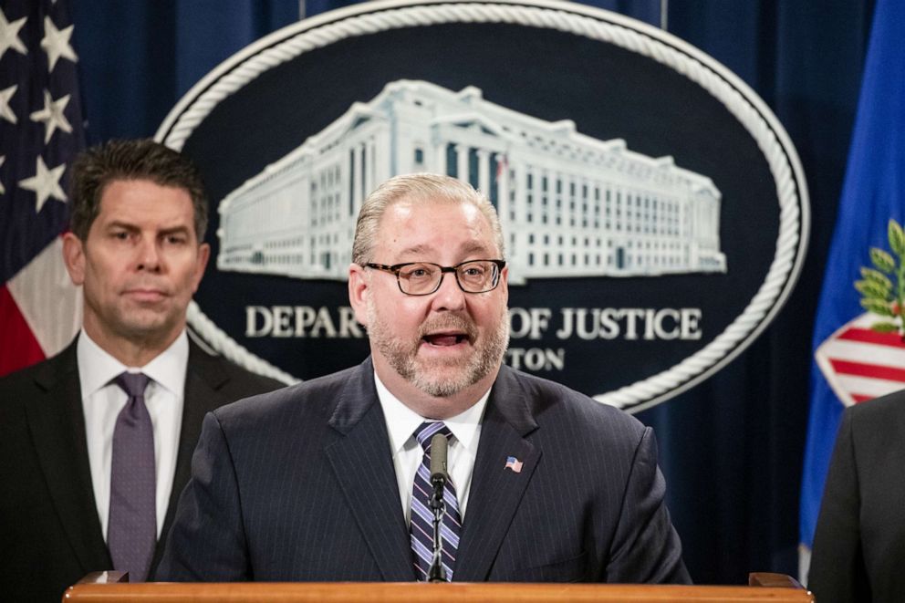 PHOTO: Assistant Attorney General Brian Benczkowski announces warrants for the arrests of Maksim Viktorovich Yakubets and Igor Olegovich Turashev at the U.S. Department of Justice on Dec. 5, 2019 in Washington, D.C.