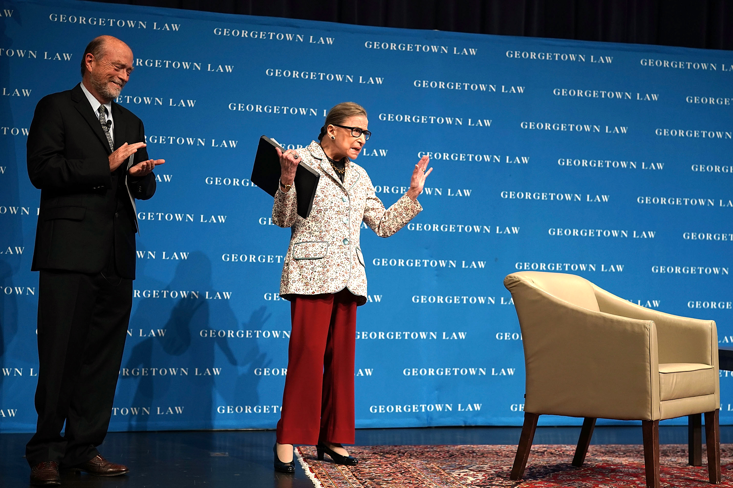 PHOTO: U.S. Supreme Court Justice Ruth Bader Ginsburg (R) waves to students as she arrives at a lecture on Sept. 26, 2018, at Georgetown University Law Center in Washington, D.C.