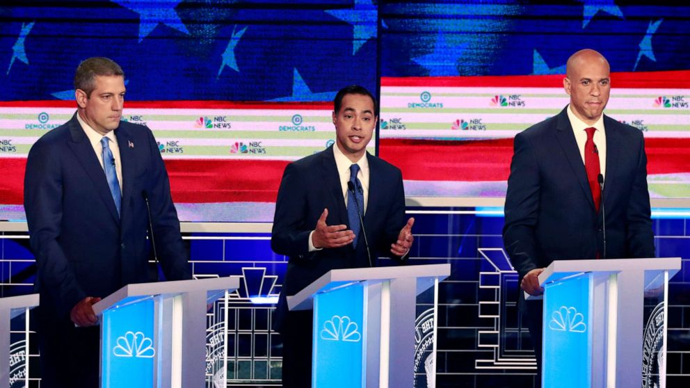 PHOTO: Tim Ryan, Julian Castro and Cory Booker participate in the first Democratic primary debate hosted by NBC News at the Adrienne Arsht Center for the Performing Arts in Miami, Florida, June 26, 2019.
