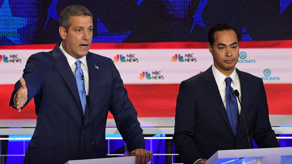 PHOTO: Tim Ryan and Julian Castro participate in the first Democratic primary debate hosted by NBC News at the Adrienne Arsht Center for the Performing Arts in Miami, Florida, June 26, 2019.