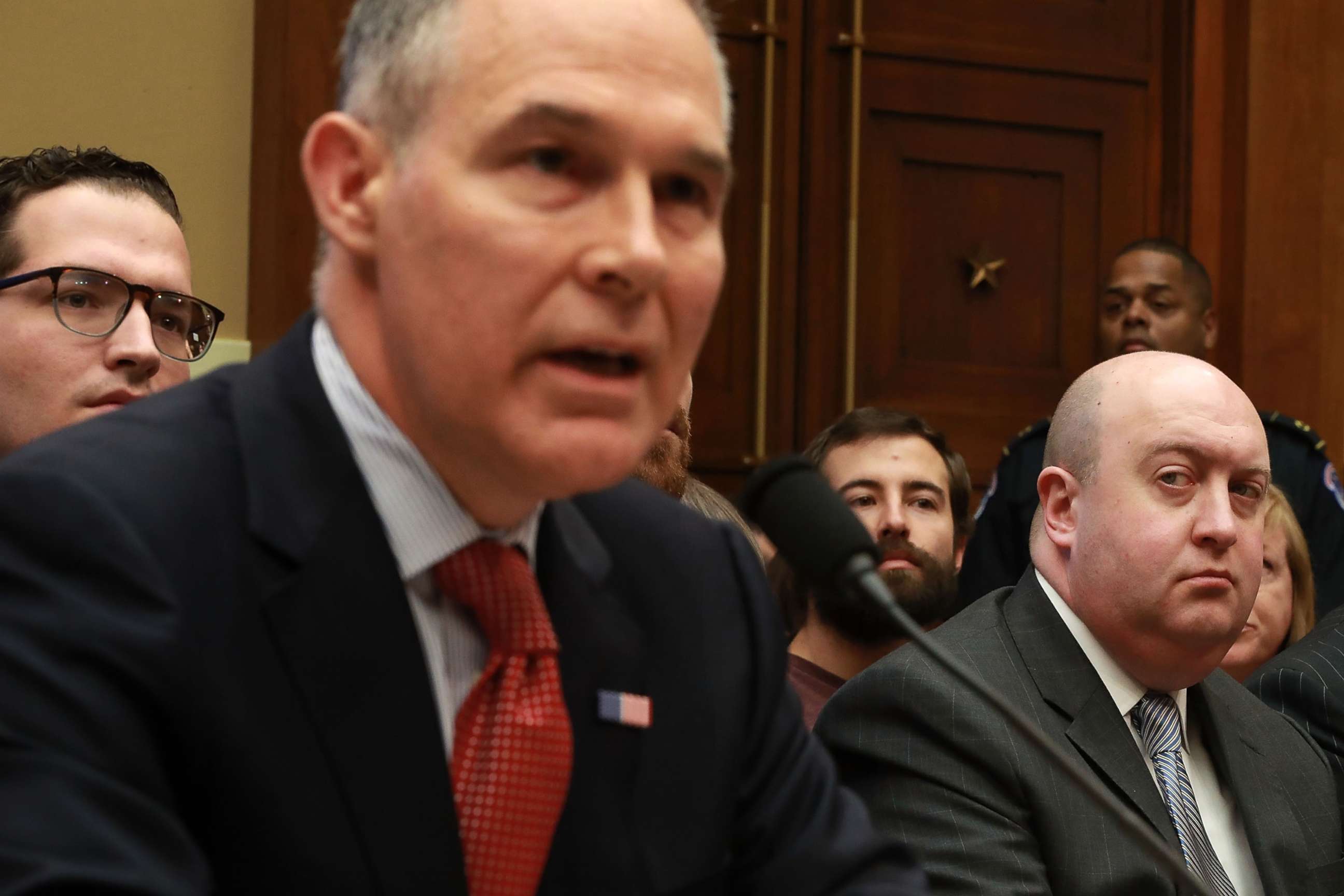 PHOTO: Environmental Protection Agency Chief of Staff Ryan Jackson (R) listens to Administrator Scott Pruitt testify before the House Energy and Commerce Committee's on Capitol Hill April 26, 2018 in Washington, DC.