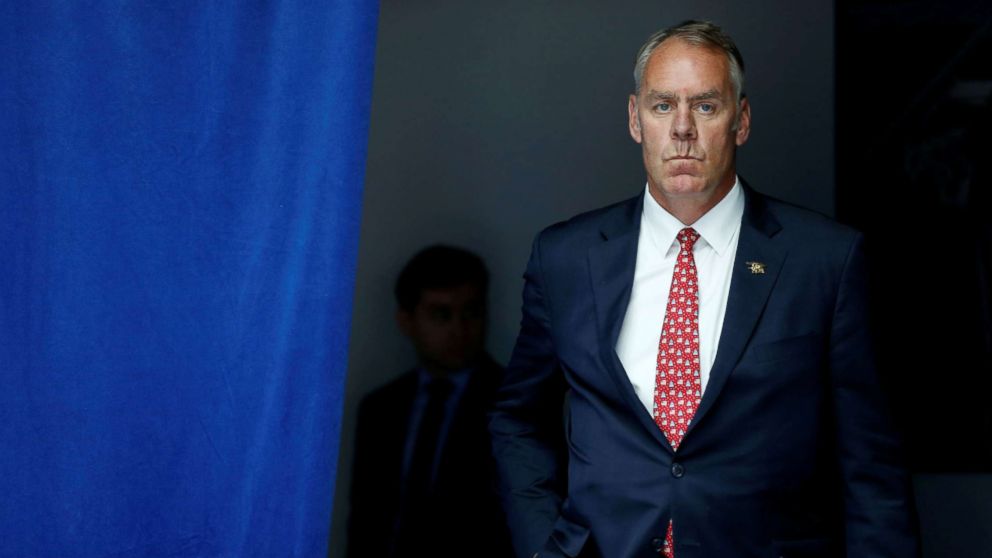 Interior Secretary Ryan Zinke waits to take the stage with President Donald Trump for his on infrastructure improvements, at the Department of Transportation in Washington D.C., June 9, 2017.  