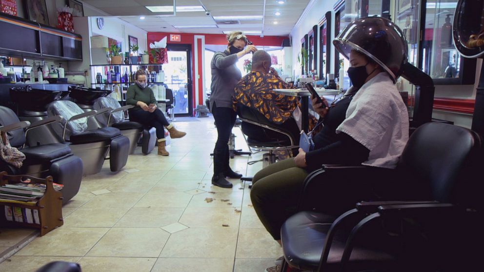 PHOTO: At Golden Scissors salon in the Mt. Pleasant neighborhood of Washington, D.C., immigrant patrons express relief at the transition to a new presidency.