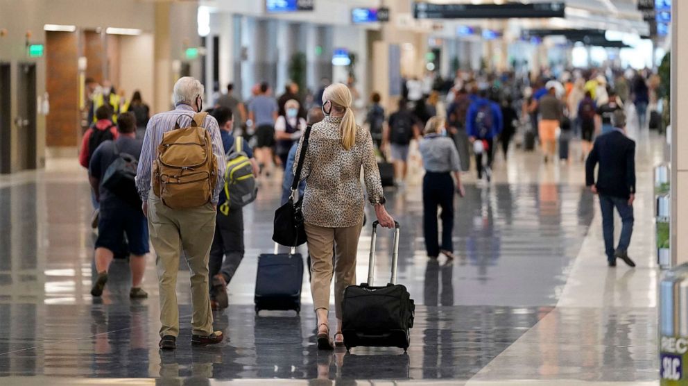 PHOTO: Passengers walk through the new terminal at the Salt Lake City International Airport, Sept. 15, 2020, in Salt Lake City.