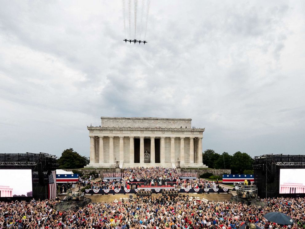 PHOTO: President Donald Trump speaks at the National Mall as a military flyover takes place during the Salute To America event on July 4, 2019 in Washington.