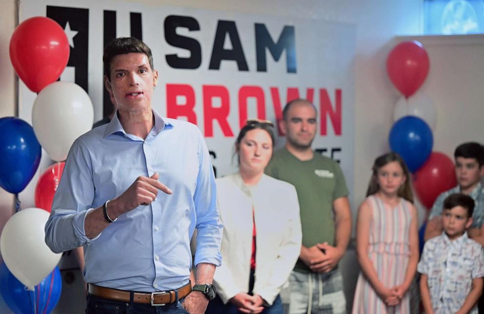 PHOTO: Republican Senate candidate, retired Army Capt. Sam Brown, thanks supporters while waiting for election results at his campaign office on June 14, 2022 in Reno, Nev.