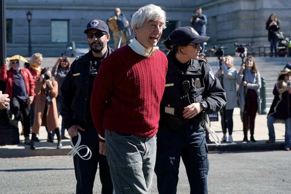 PHOTO: Sam Waterston is handcuffed and detained by Capitol Police during the "Fire Drill Fridays" protest outside the Library of Congress in Washington, Oct. 18, 2019.