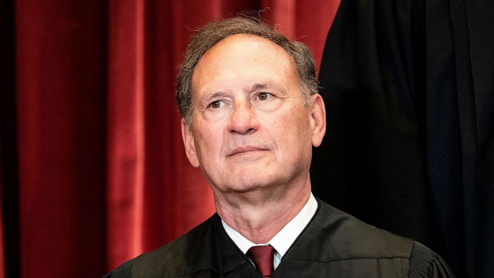 PHOTO: Associate Justice Samuel Alito poses during a group photo of the Justices at the Supreme Court in Washington, April 23, 2021.