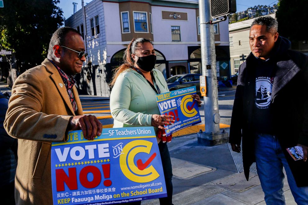 PHOTO: Facing a recall, San Francisco school board member Faauuga Moliga canvasses with Dr. Ponipate Rokolekutu, left, and Gaynor Siataga, right, before polls close, Feb. 15, 2022 in San Francisco, Calif.