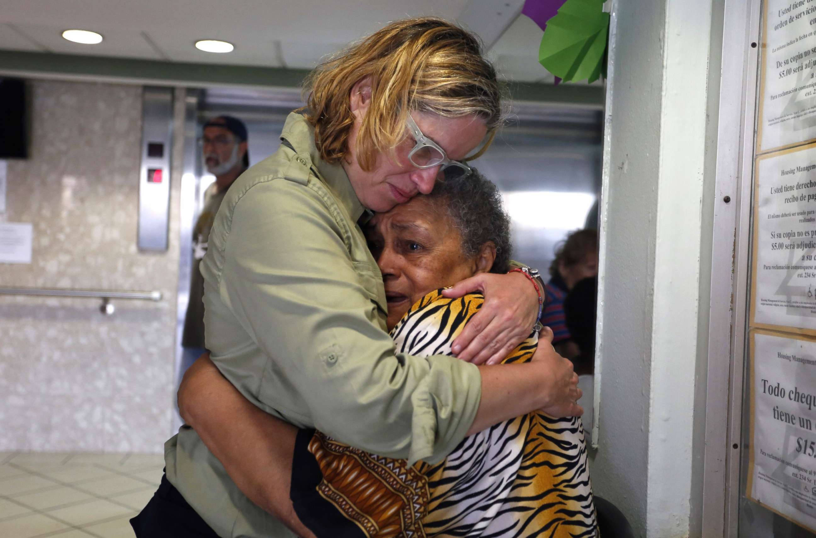 PHOTO: San Juan's Mayor Carmen Yulin Cruz, left, hugs a woman during her visit to an elderly home in San Juan, Puerto Rico, Sept. 22, 2017. 