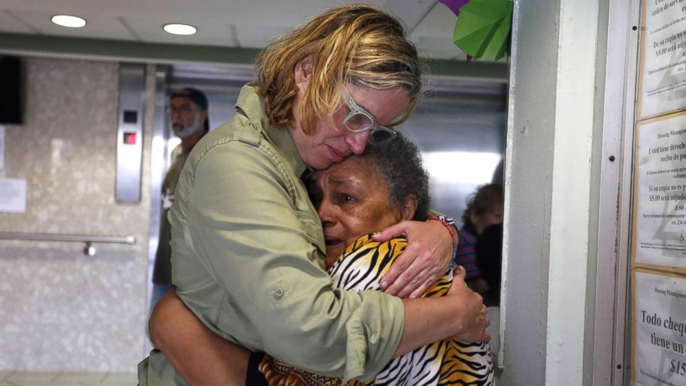 PHOTO: San Juan's Mayor Carmen Yulin Cruz, left, hugs a woman during her visit to an elderly home in San Juan, Puerto Rico, Sept. 22, 2017.