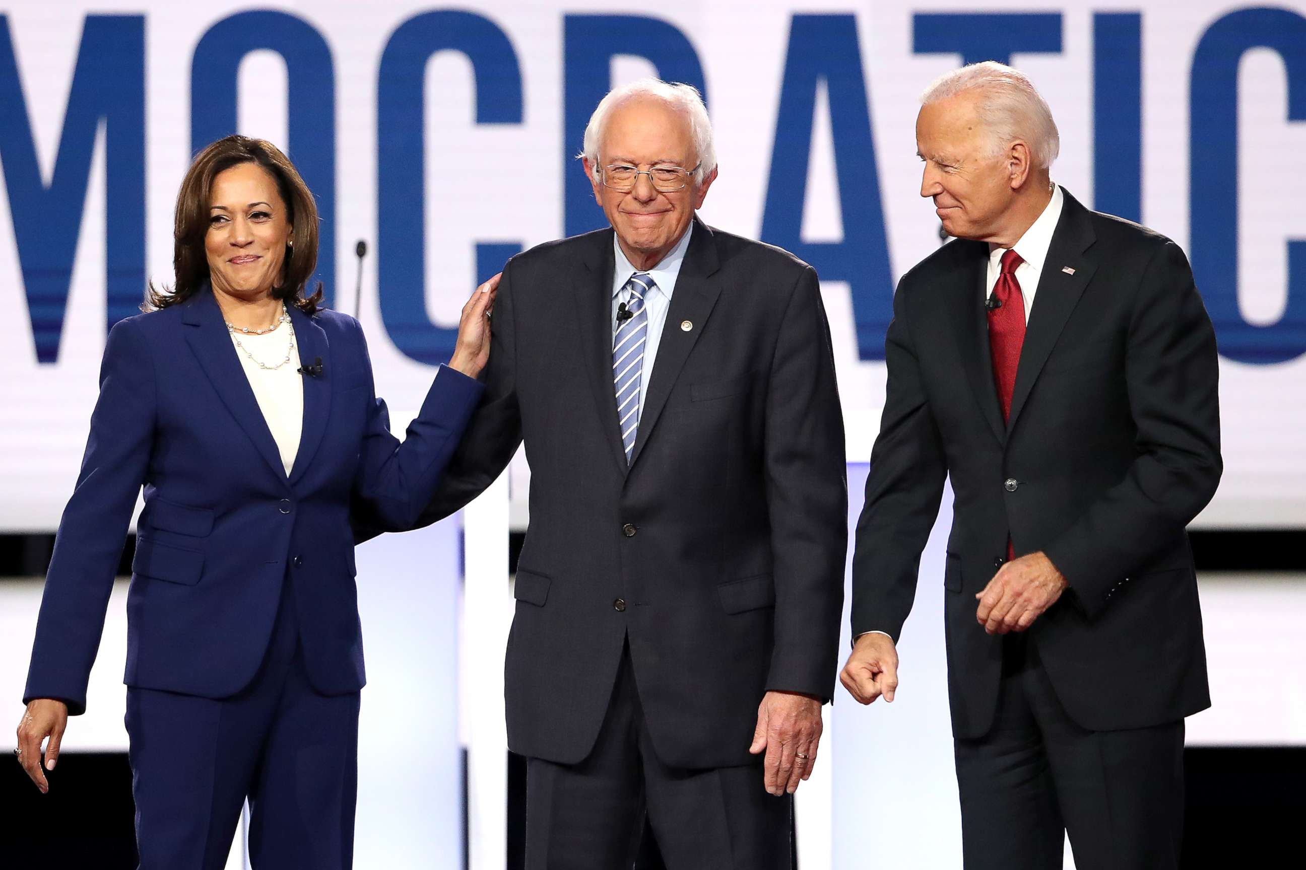 PHOTO: Sen. Kamala Harris, Sen. Bernie Sanders, and former Vice President Joe Biden enter the stage before the Democratic Presidential Debate at Otterbein University on October 15, 2019 in Westerville, Ohio.