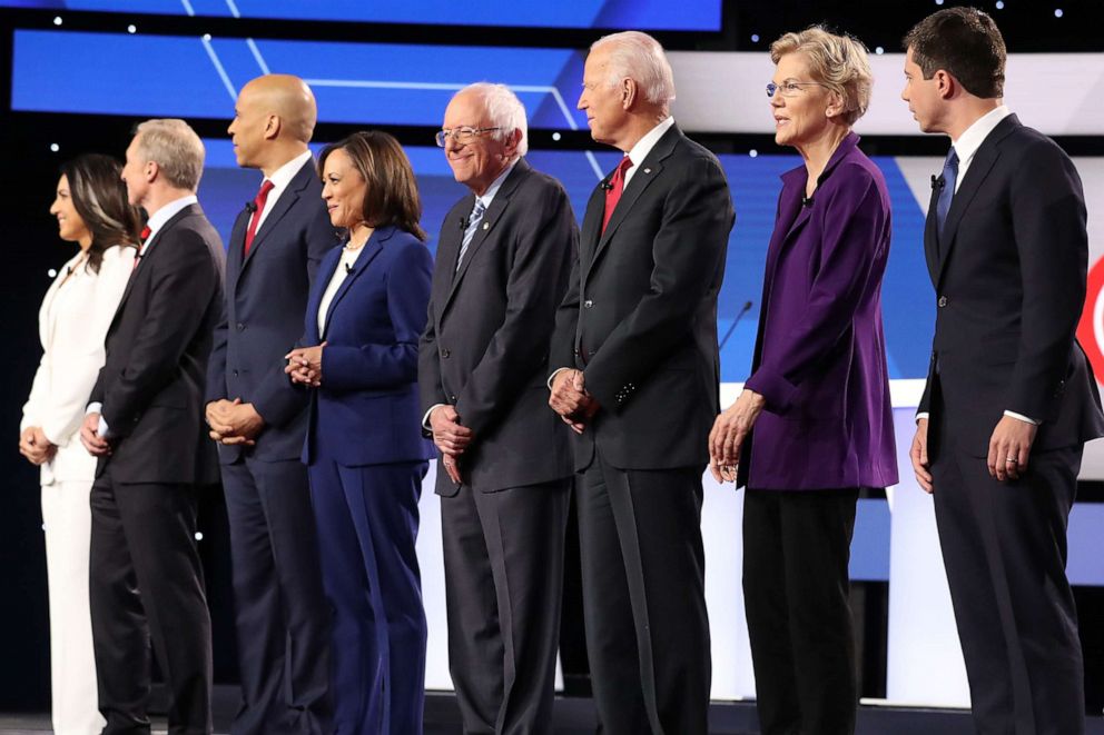 PHOTO: Democratic presidential candidates are seen before the start of the Democratic Presidential Debate at Otterbein University on October 15, 2019 in Westerville, Ohio.