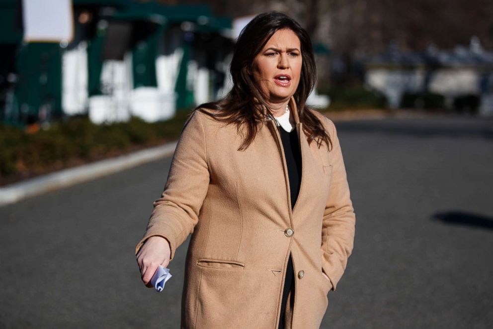 PHOTO: White House press secretary Sarah Huckabee Sanders talks with reporters outside the White House, Dec. 18, 2018.