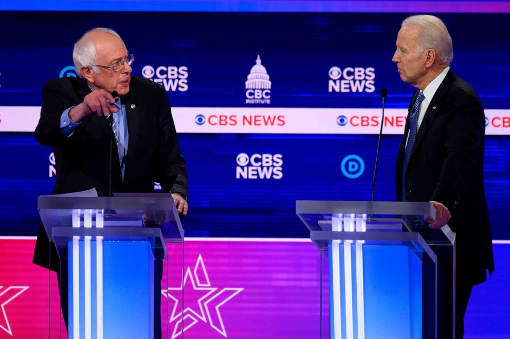 PHOTO: Democratic presidential hopefuls Bernie Sanders and Joe Biden participate in the tenth Democratic primary debate at the Gaillard Center in Charleston, South Carolina, Feb. 25, 2020.