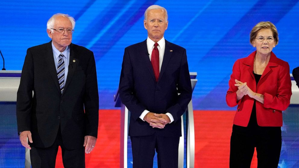 PHOTO: Senator Bernie Sanders joins former Vice President Joe Biden and Senator Elizabeth Warren onstage before the start at the 2020 Democratic U.S. presidential debate in Houston, Sept.12, 2019.