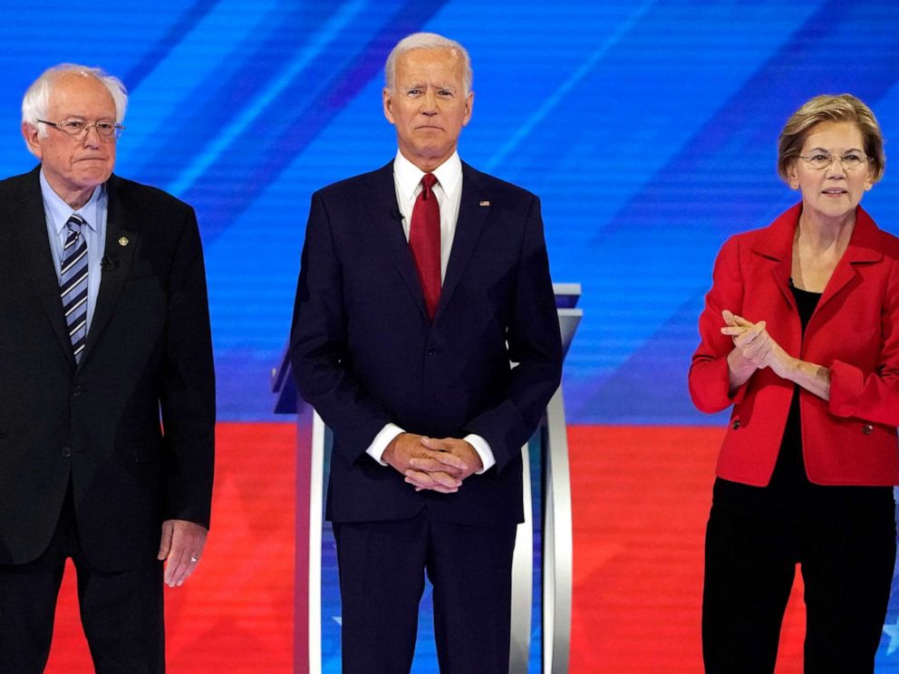 PHOTO: Senator Bernie Sanders joins former Vice President Joe Biden and Senator Elizabeth Warren onstage before the start at the 2020 Democratic U.S. presidential debate in Houston, Sept.12, 2019.