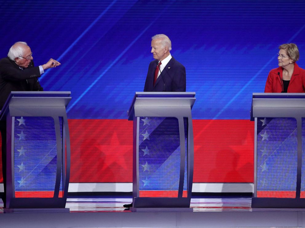 PHOTO: Democratic presidential candidates Sen. Bernie Sanders speaks as former Vice President Joe Biden and Sen. Elizabeth Warren listen during the Democratic Presidential Debate, Sept. 12, 2019 in Houston, Texas.