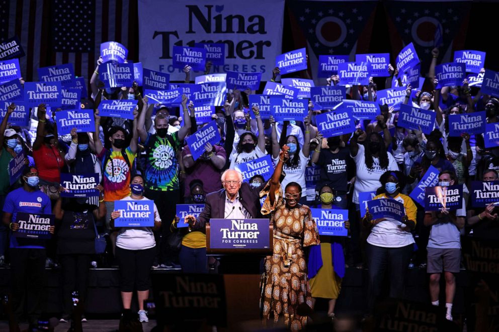 PHOTO: Sen. Bernie Sanders raises the hand of Congressional Candidate Nina Turner during a Get Out the Vote rally, July 31, 2021, in Cleveland.
