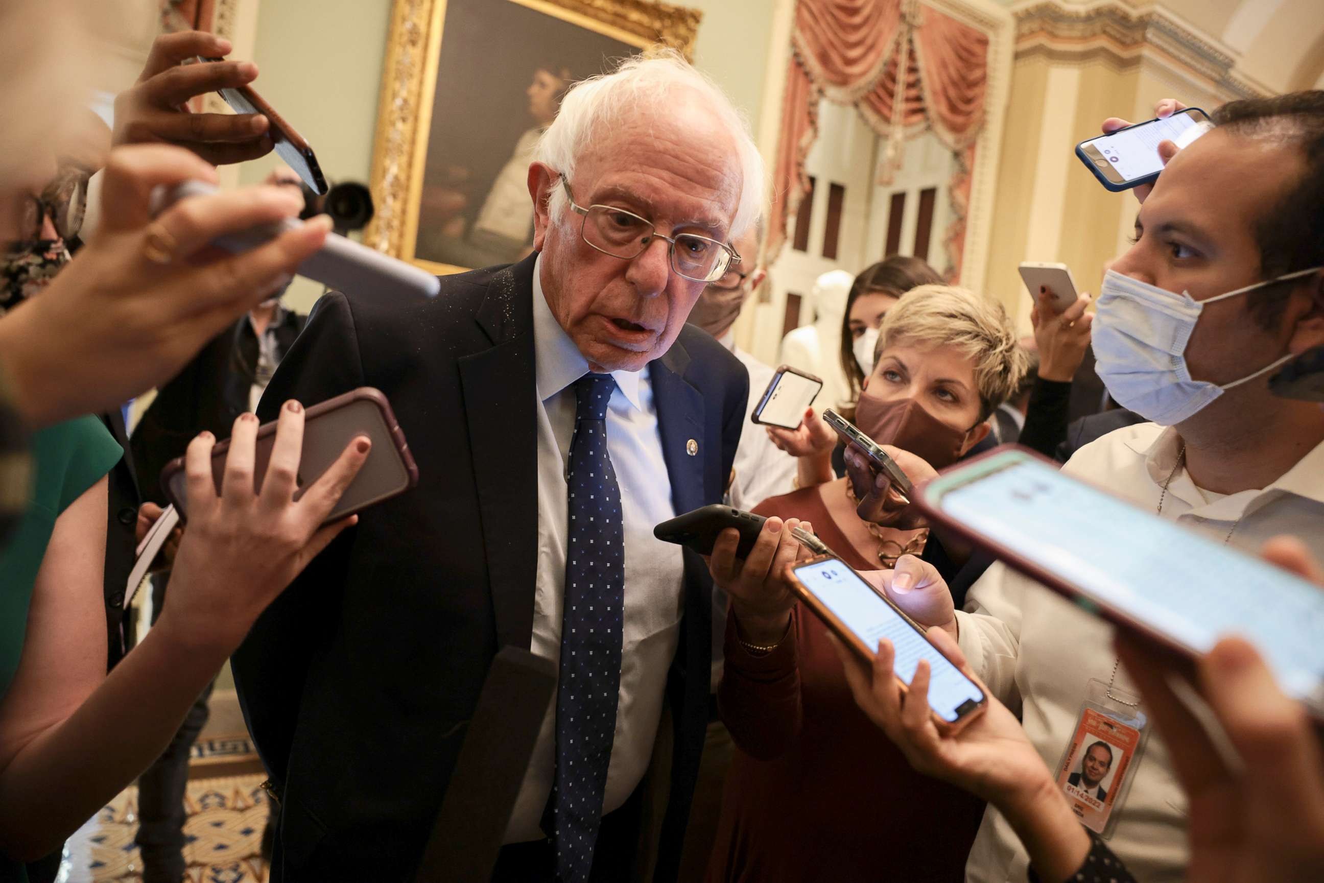 PHOTO: Sen. Bernie Sanders speaks with reporters after leaving a Senate Democrat Luncheon, Oct. 19, 2021, in Washington, D.C.