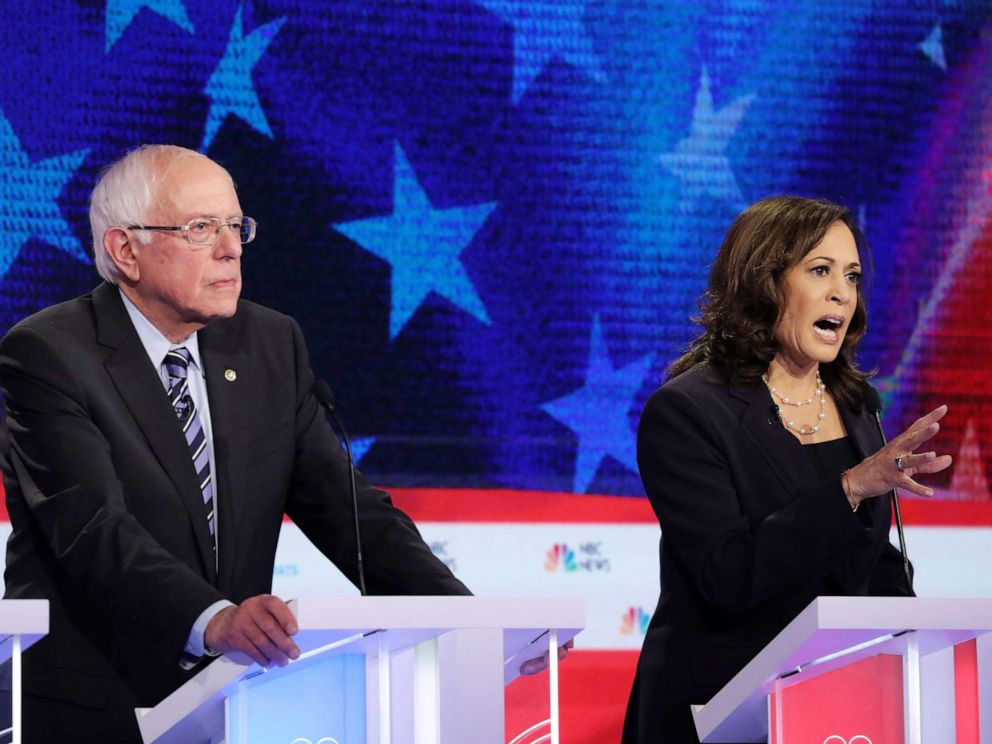 PHOTO: Bernie Sanders and Kamala Harris participate in the second night of the first 2020 democratic presidential debate at the Adrienne Arsht Center for the Performing Arts in Miami, June 27, 2019.