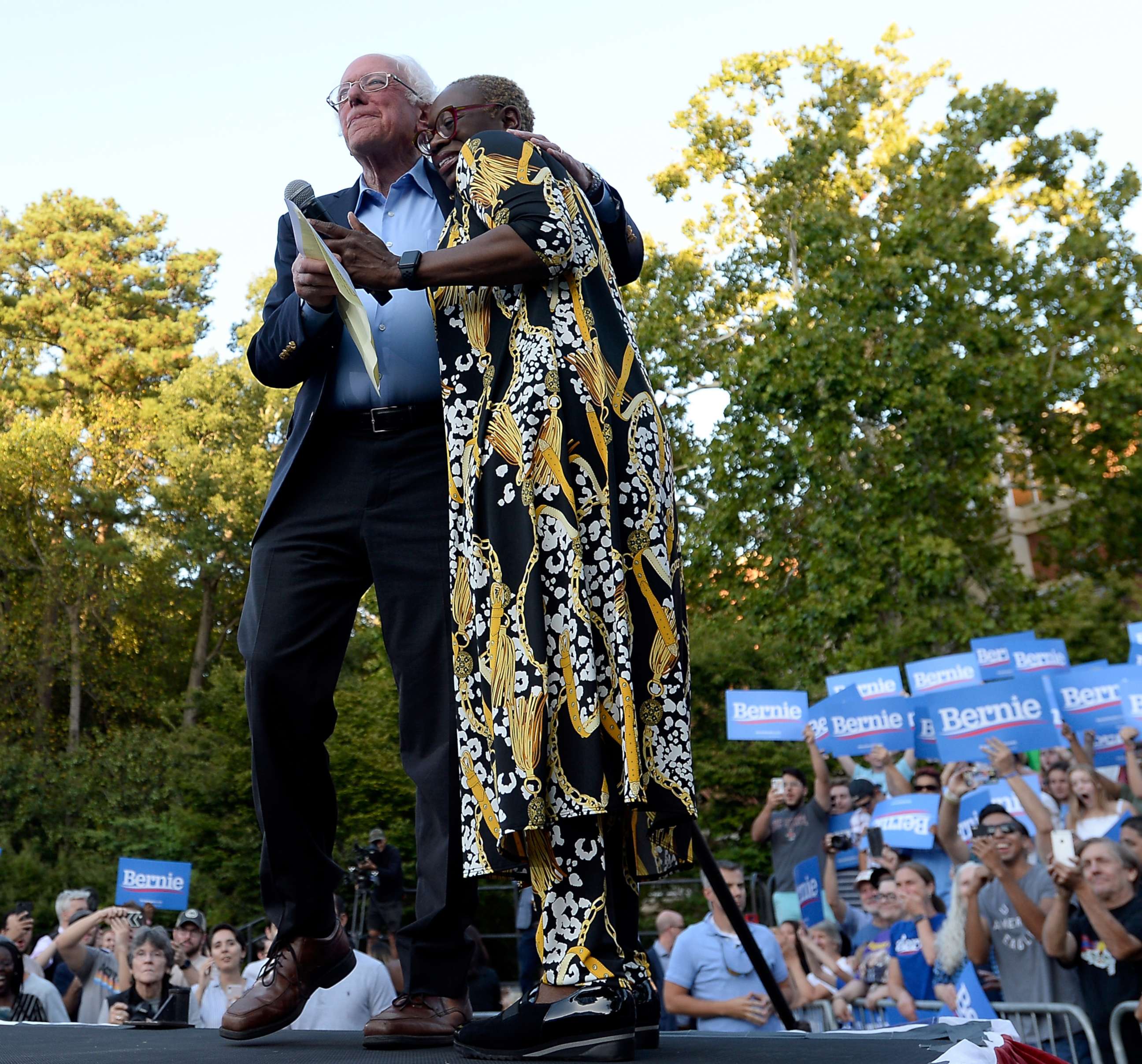 PHOTO: Nina Turner and  Democratic presidential candidate Sen. Bernie Sanders hug on stage at the campus of the University of Chapel Hill during a campaign rally, Sept. 19, 2019, in Chapel Hill, North Carolina.