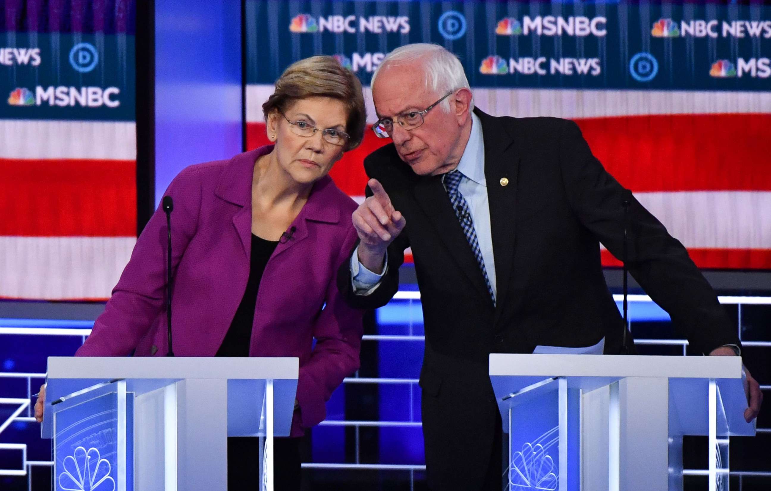PHOTO: Democratic presidential hopefuls Sen. Elizabeth Warren and Sen. Bernie Sanders talk during the ninth Democratic primary debate of the 2020 presidential campaign season at the Paris Theater in Las Vegas, Feb. 19, 2020.