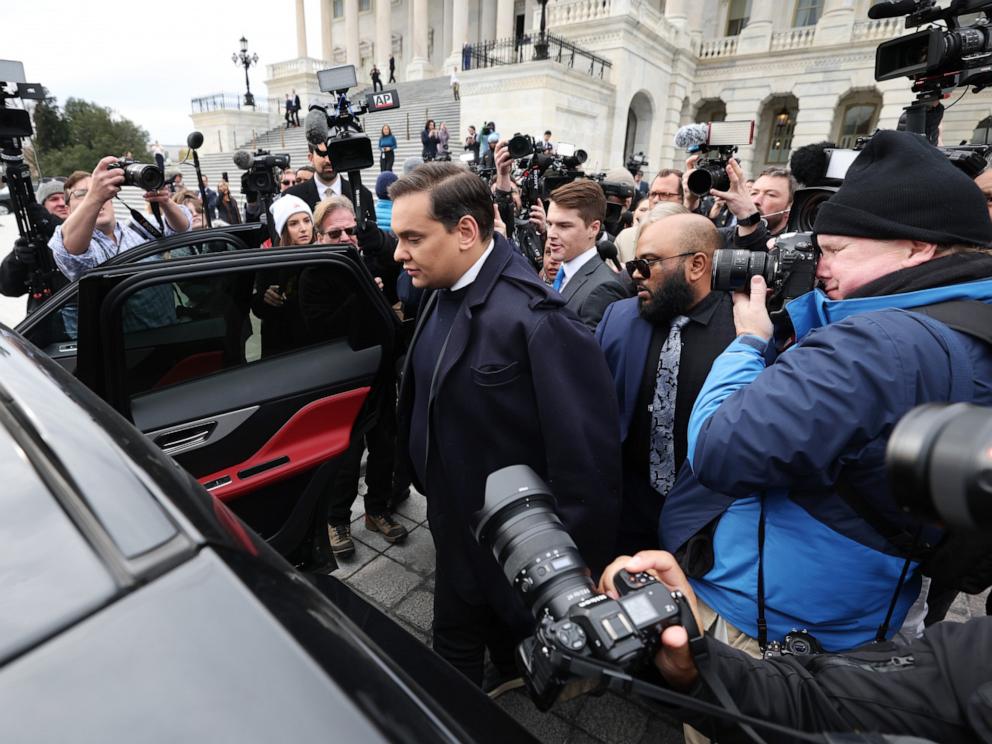 PHOTO: Rep. George Santos is surrounded by journalists as he leaves the U.S. Capitol after his fellow members of Congress voted to expel him from the House of Representatives on Dec. 1, 2023 in Washington, DC.