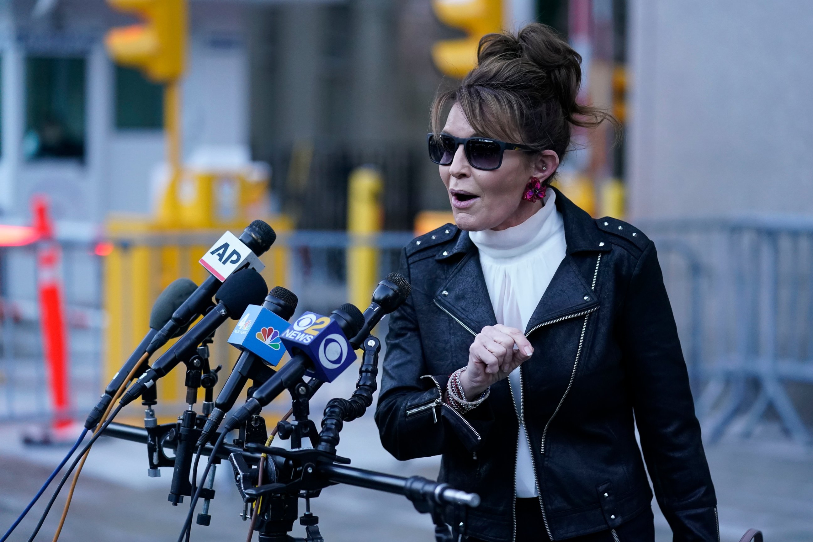 PHOTO: Former Alaska Gov. Sarah Palin speaks briefly to reporters as she leaves a courthouse in New York, Monday, Feb. 14, 2022.