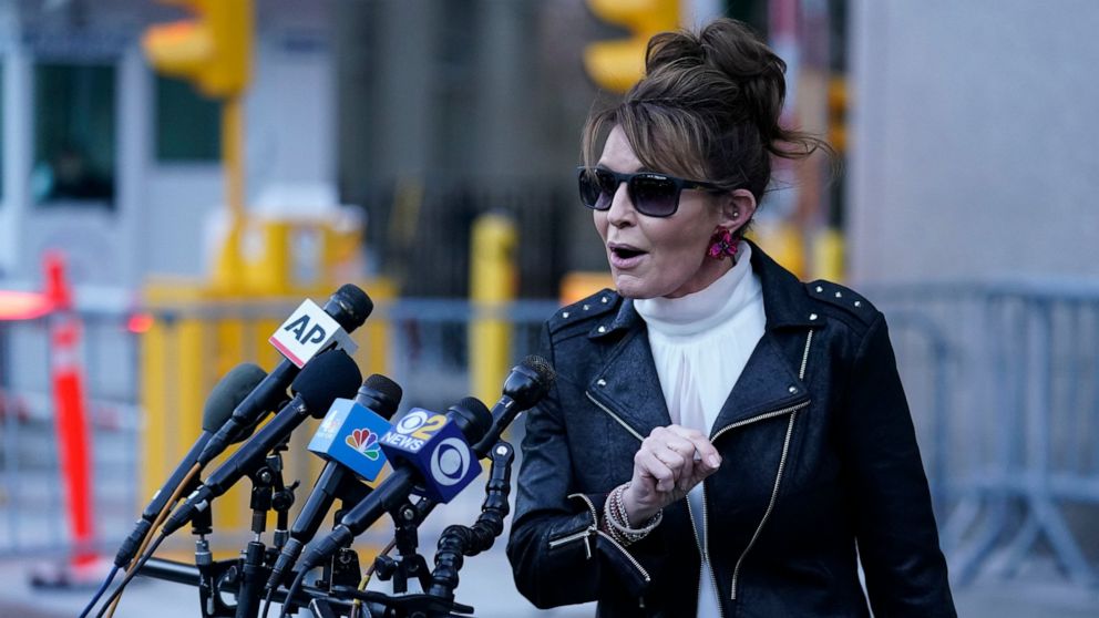 PHOTO: Former Alaska Gov. Sarah Palin speaks briefly to reporters as she leaves a courthouse in New York, Monday, Feb. 14, 2022.
