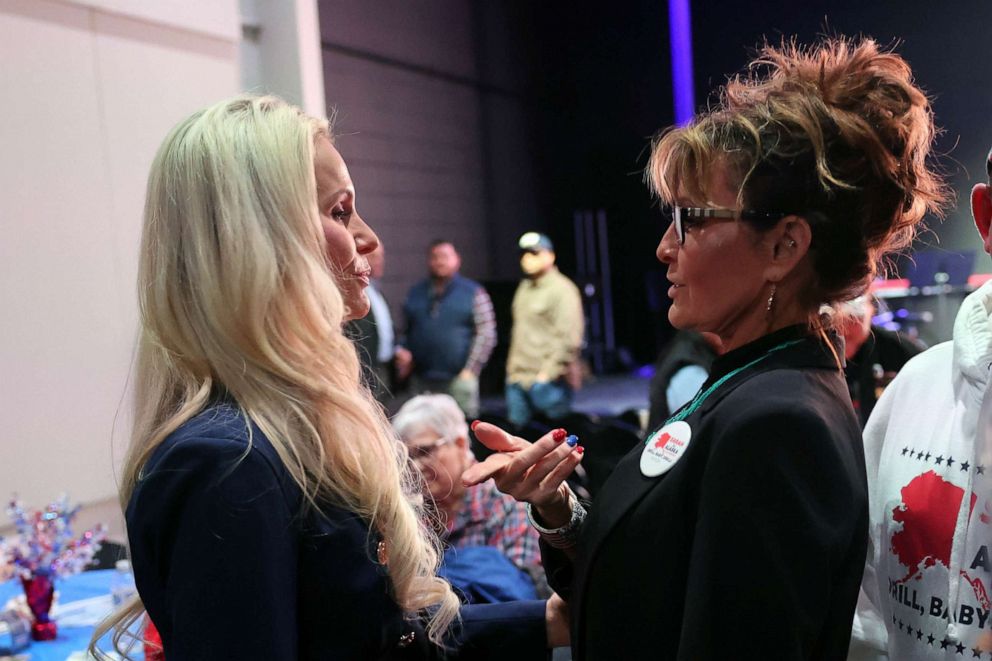 PHOTO: Former Governor of Alaska and Republican candidate for Congress, Sarah Palin, stands with Republican U.S. Senate candidate Kelly Tshibaka at a Get Out The Vote event hosted by the Alaska Republican Party, Nov. 06, 2022 in Anchorage, Alaska. 