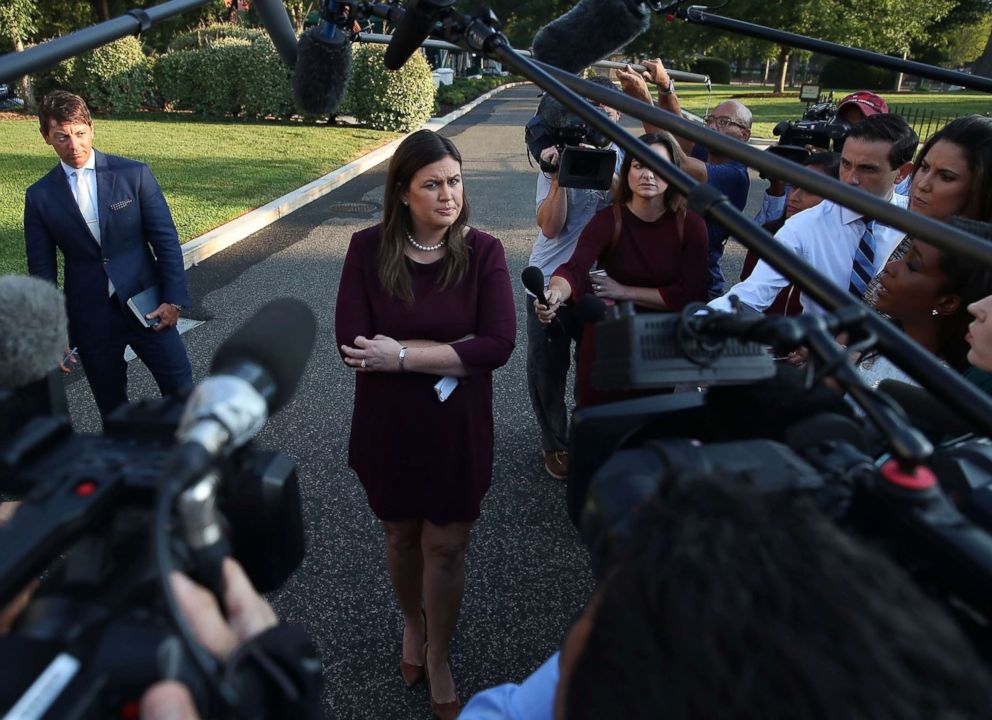 PHOTO: White House Press Secretary Sarah Huckabee Sanders speaks to the media in front of the West Wing of the White House, Sept. 5, 2018 in Washington.