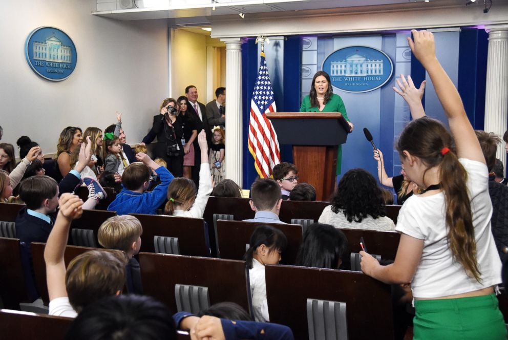 PHOTO: White House press secretary Sarah Huckabee Sanders answers questions from children of journalists in the press briefing room, April 26, 2018, in Washington, D.C. 